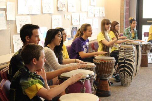Students drumming 
